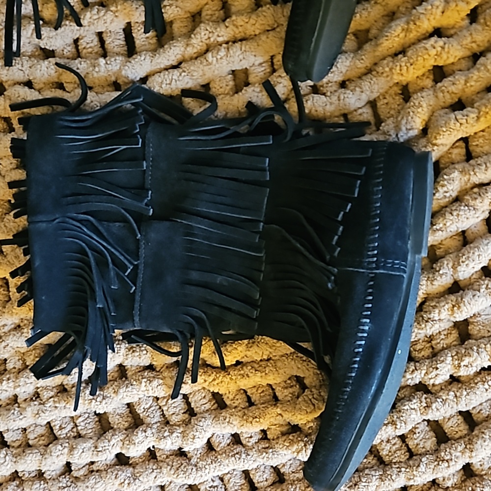 Brand new never worn Minnetonka boots